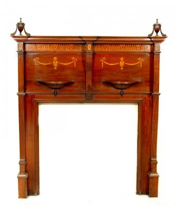 Appraisal: AN EDWARDIAN MAHOGANY CHIMNEY PIECE of inverted breakfront form with