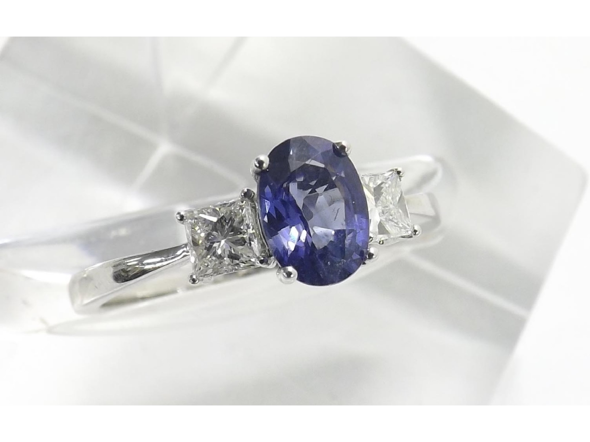 Appraisal: k sapphire and diamond white gold three stone ring oval