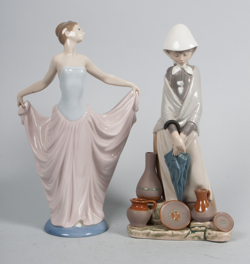 Appraisal: Two Lladro porcelain figures Dancer in H and pottery seller