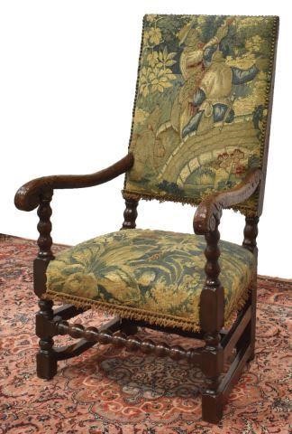 Appraisal: Louis XIII style armchair th c in worn tapestry upholstery