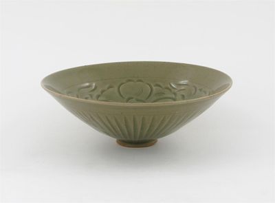 Appraisal: A Chinese Northern celadon flared bowl the interior finely carved