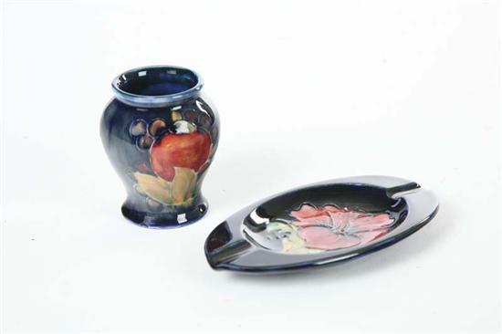 Appraisal: TWO PIECES OF MOORCROFT Pomegranate vase h Pansy ashtray l