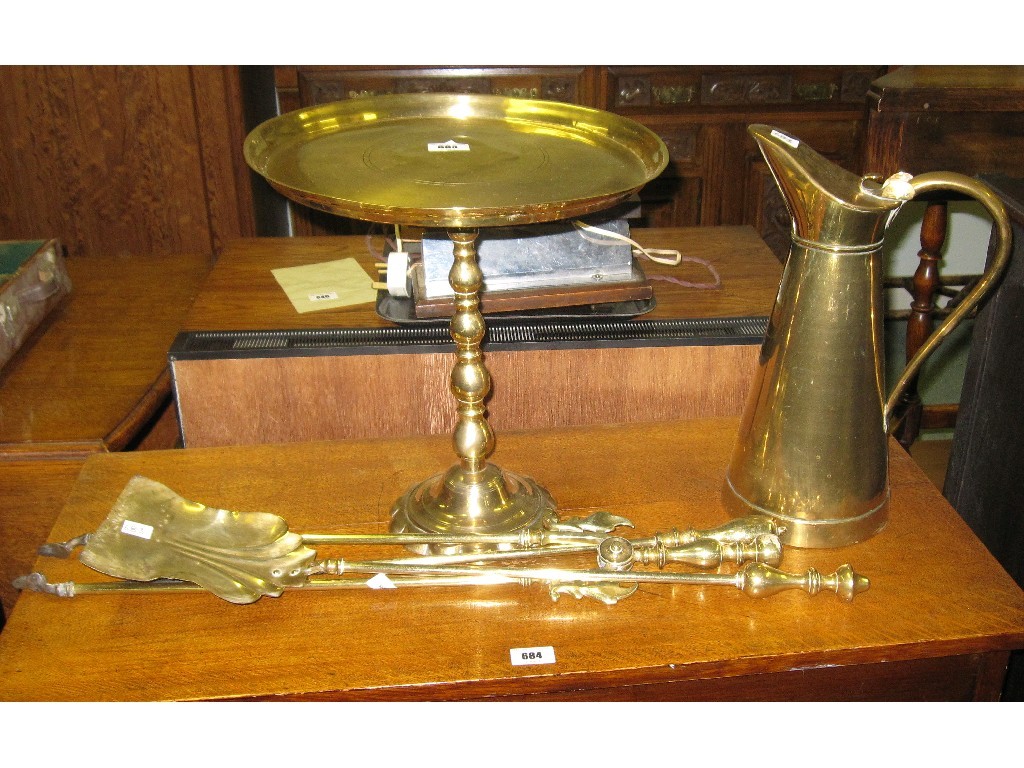 Appraisal: Lot comprising brass pedestal tray jug and fire irons