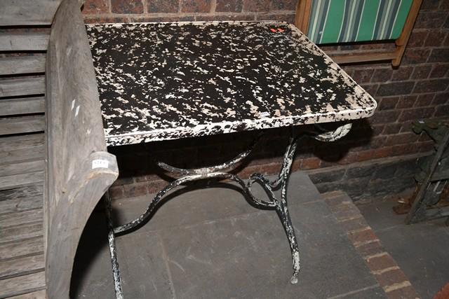 Appraisal: AN OUTDOOR WROUGHT IRON TABLE