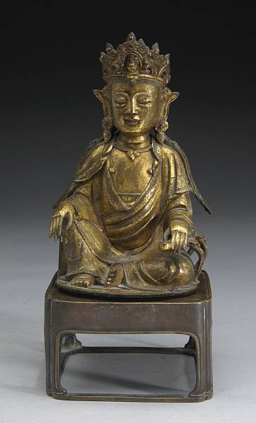 Appraisal: A gilt bronze seated Guanyin Late Ming Dynasty th Century