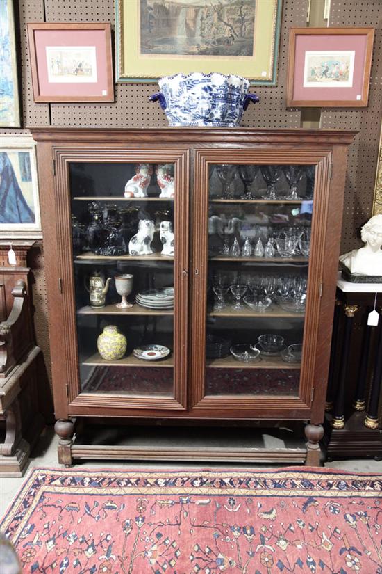 Appraisal: BOOKCASE Oak having a molded cornice with two large glazed