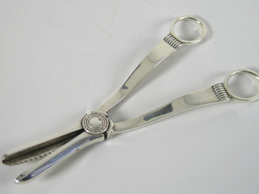 Appraisal: Pair of George V Grape Scissors with serrated cutter Sheffield