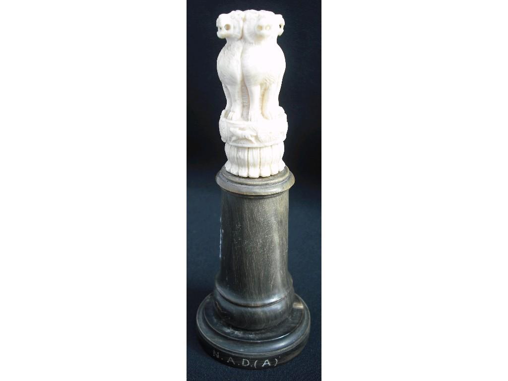 Appraisal: Indian ivory carving modelled with four lions upon a circular