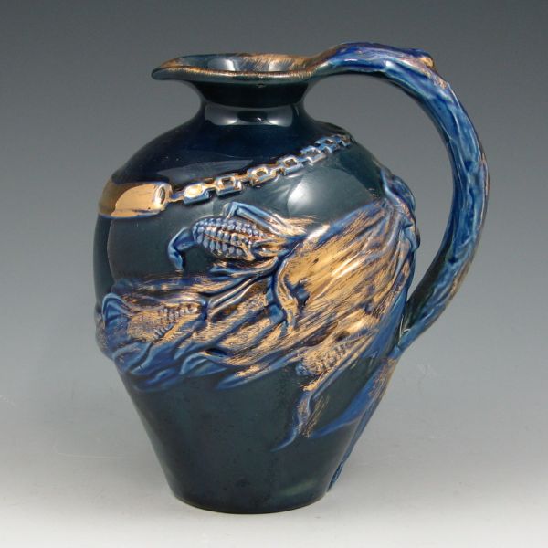 Appraisal: Matt Morgan Pottery jug with embossed corn design in blue