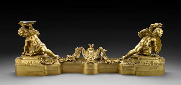 Appraisal: A pair of Louis XVI style gilt bronze chenets and