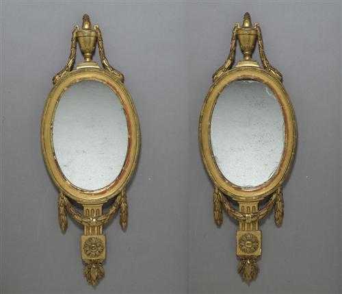 Appraisal: PAIR OF OVAL MIRRORS late Louis XVI France th century