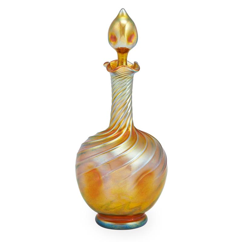 Appraisal: STEUBEN AURENE DECANTER Iridescent glass with swirl design early th