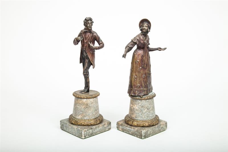 Appraisal: Pair of Patinated Metal Figures of a Regency Gentleman and