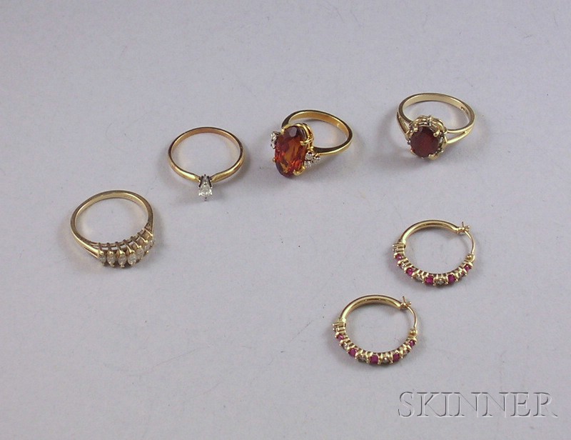 Appraisal: Group of Gold Diamond and Gemstone Jewelry four rings and