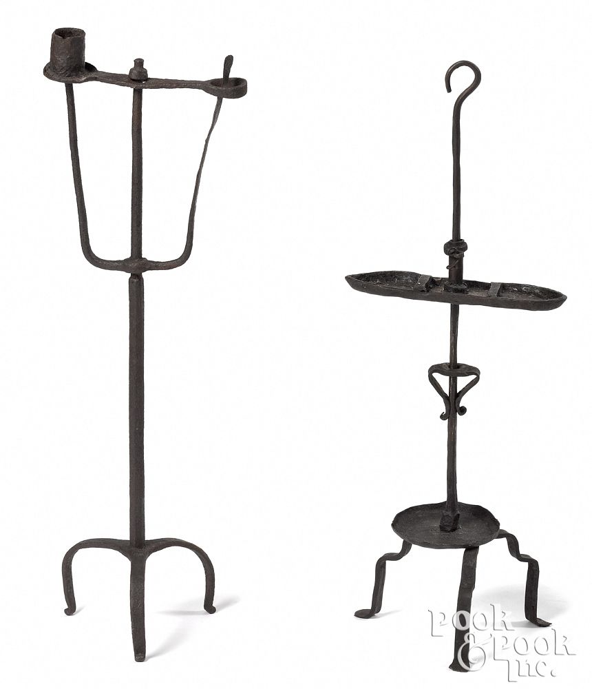 Appraisal: Two adjustable wrought iron candlestands th c Two adjustable wrought