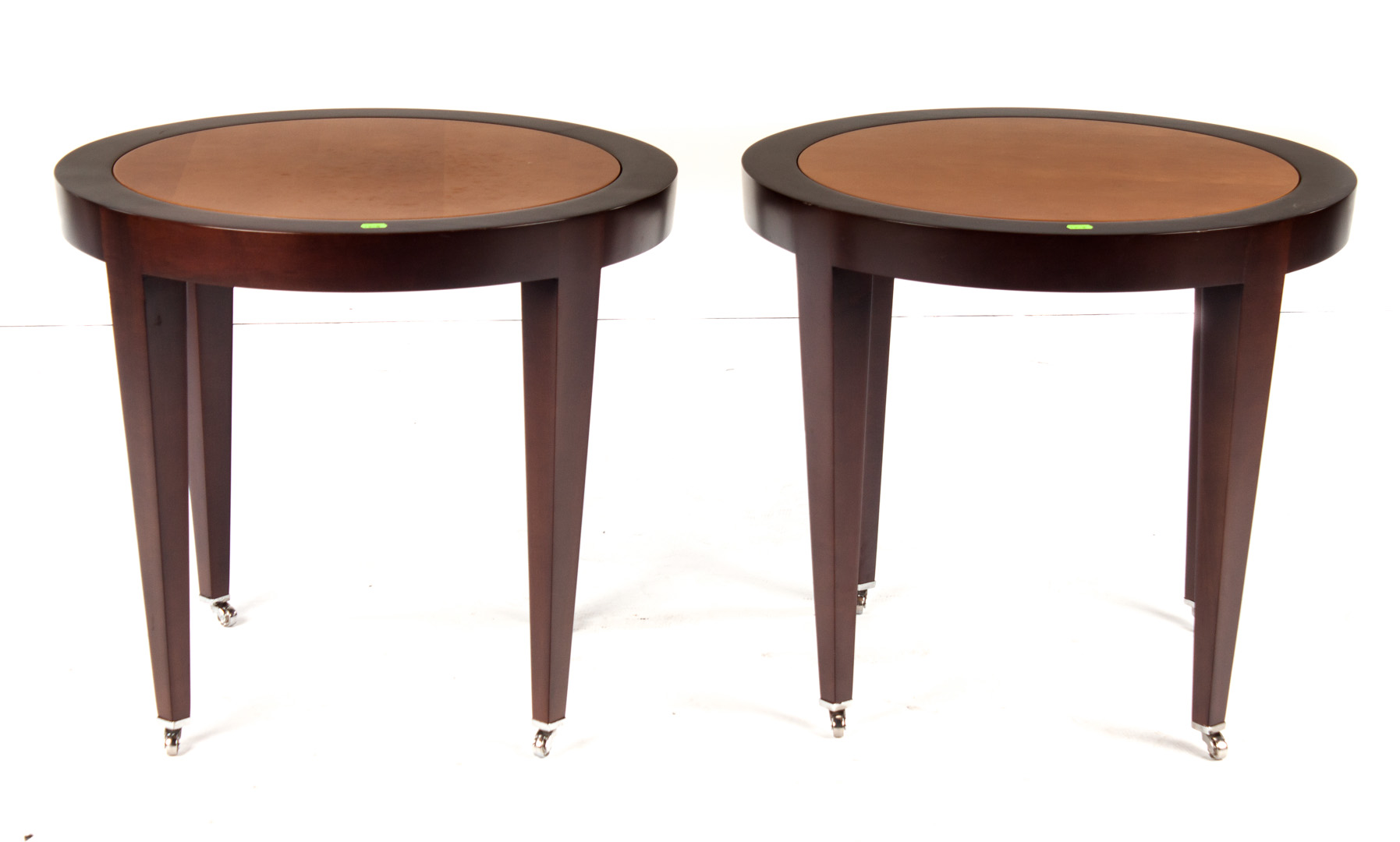 Appraisal: Pair of Donghia contemporary circular tables birch and maple tables