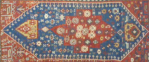 Appraisal: Kazak rug with random shapes and human figures on blue