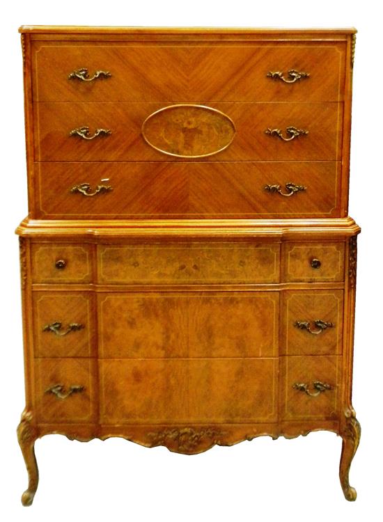 Appraisal: th C French style tall chest raised on four carved