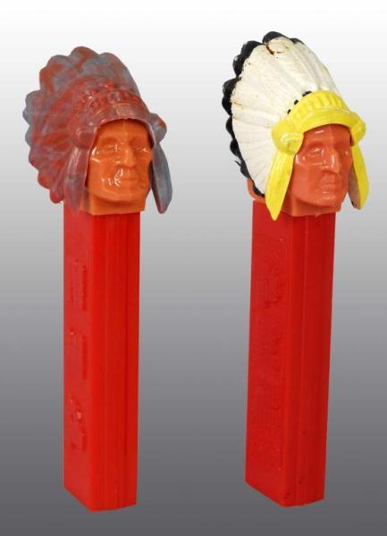 Appraisal: Lot of Indian Pez Dispensers Description One with white headdress