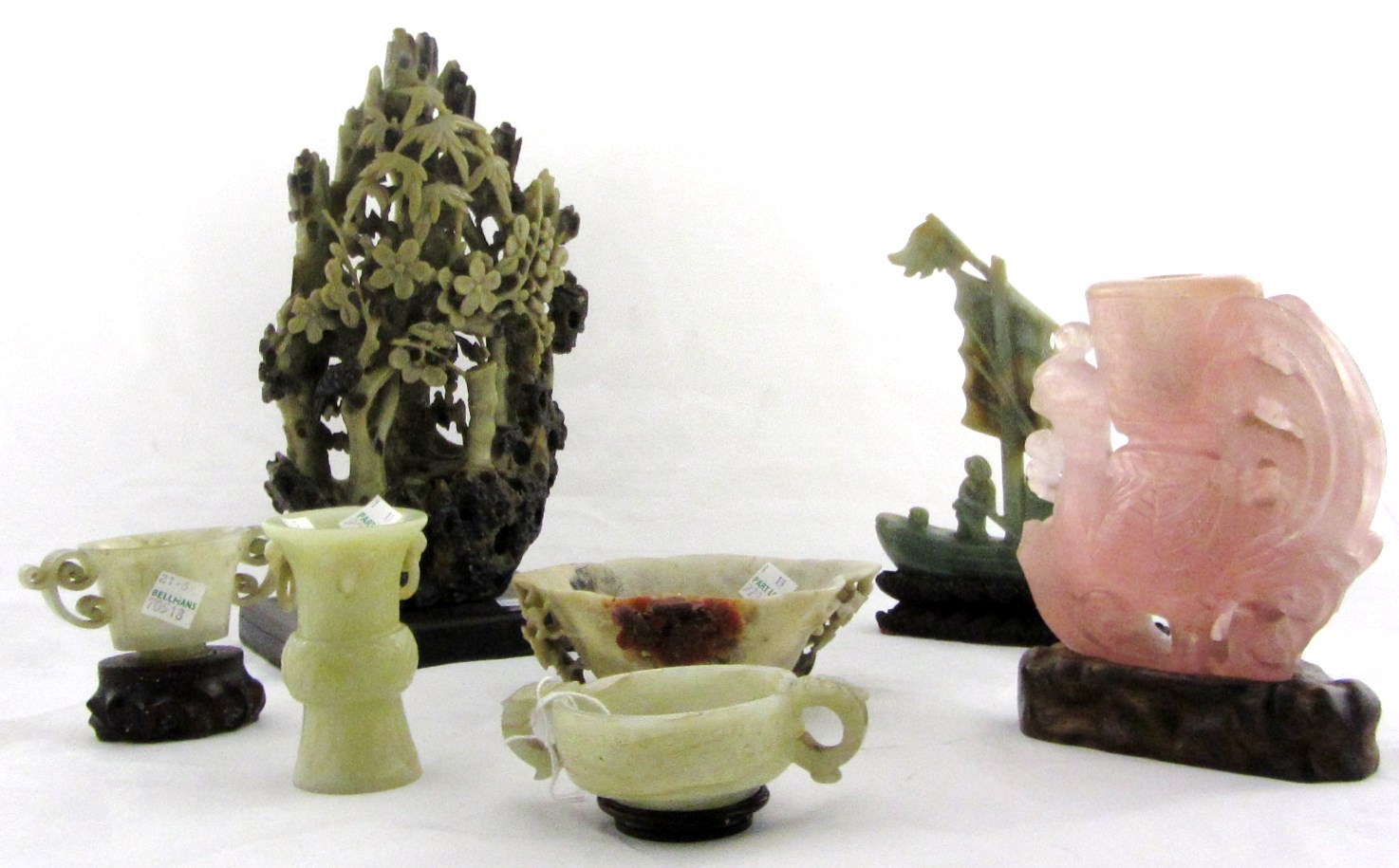 Appraisal: A group of Chinese hardstone carvings th h century comprising