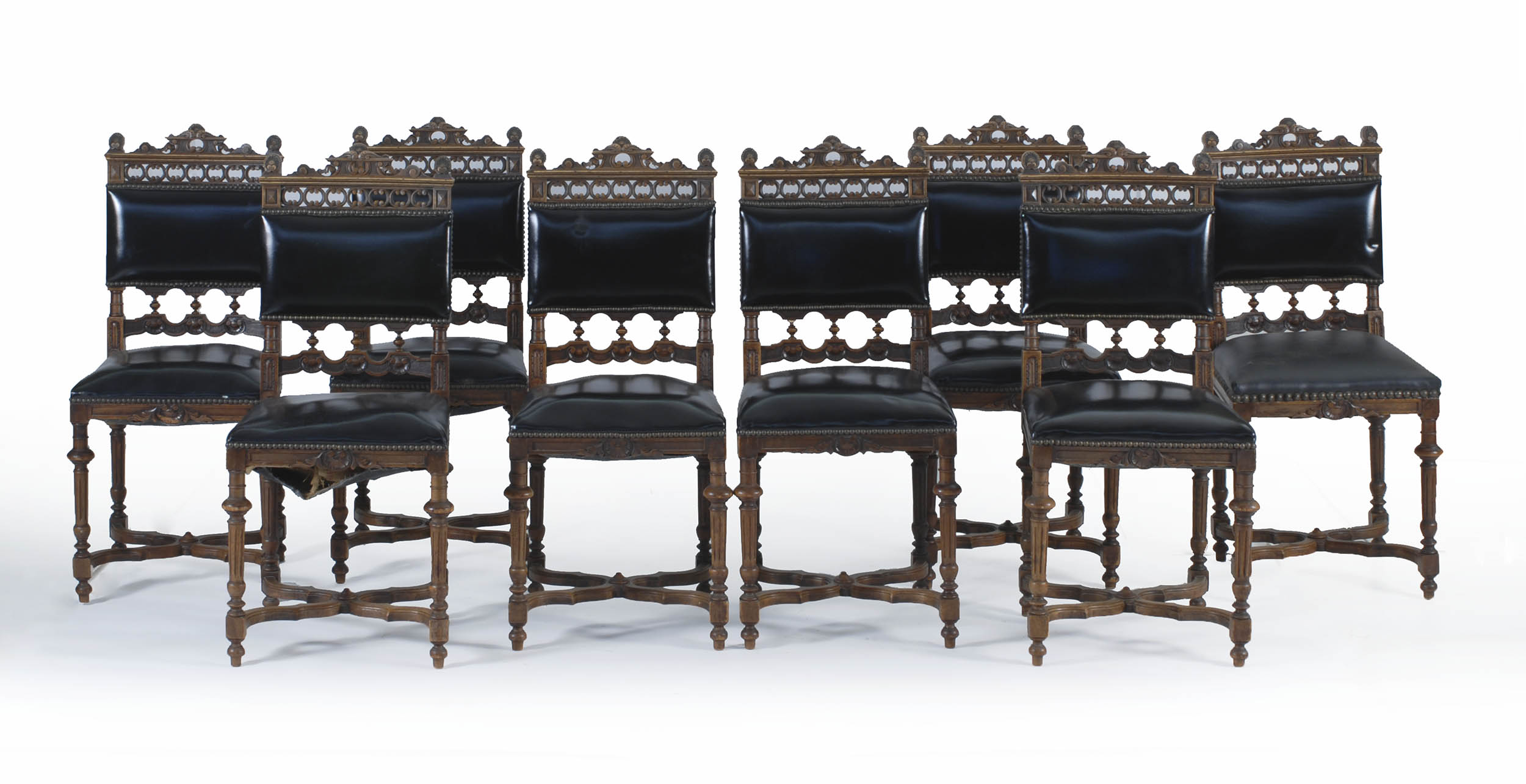 Appraisal: SET OF EIGHT VICTORIAN-STYLE SIDE CHAIRS in walnut with elaborately