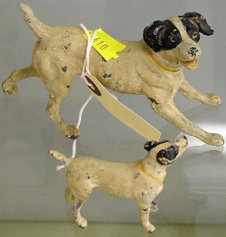 Appraisal: Painted spelter figure of a terrier high together with another