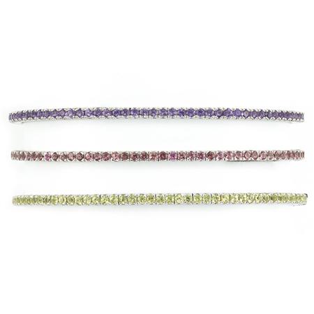 Appraisal: Three White Gold Amethyst Peridot and Pink Tourmaline Bangle Bracelets