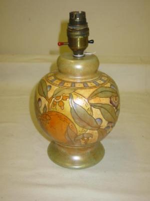 Appraisal: A BURSLEIGH CHARLOTTE RHEAD POTTERY TABLE LAMP tube lined with