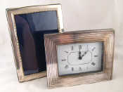 Appraisal: A silver faced electronic desk clock Italian assay London import