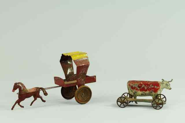 Appraisal: HORSE WITH CART AND BULL PULL TOYS Early American tin