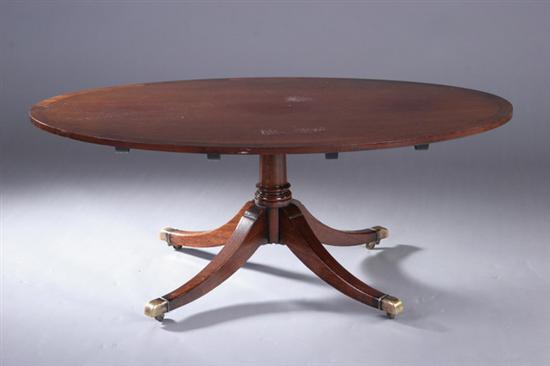 Appraisal: PAIR REGENCY STYLE MAHOGANY LOW TABLES th century Each oval