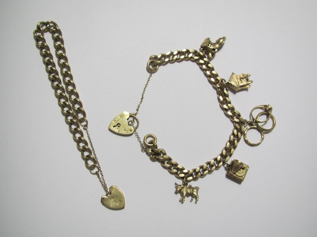 Appraisal: A ct gold curb bracelet set with five charms and