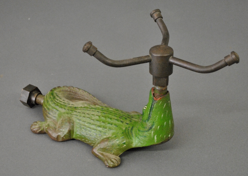 Appraisal: - Cast iron alligator lawn sprinkler with original paint and