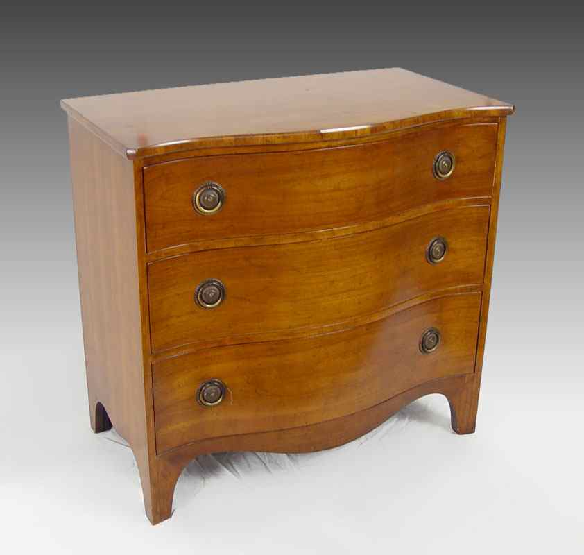 Appraisal: BAKER FURNITURE HEPPLEWHITE STYLE MAHOGANY CHEST Three drawer serpentine front