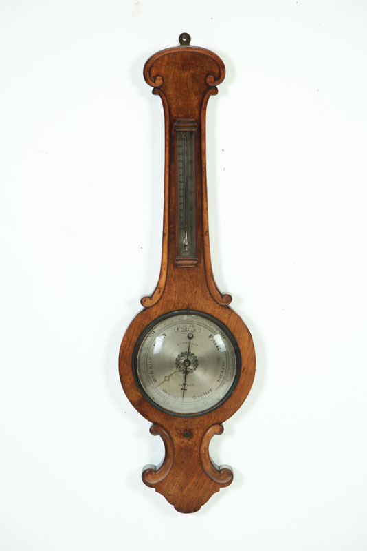 Appraisal: BAROMETER England mid th century mahogany Metal dial marked for