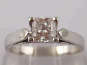 Appraisal: A white metal tests carat gold diamond solitaire ring the