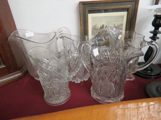 Appraisal: Pattern Glass Pitchers circa mostly various designs