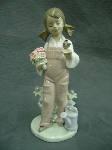 Appraisal: Lladro Porcelain Figurine Spring depicting girl with bouquet and bird