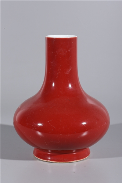 Appraisal: Chinese porcelain red glazed vase with six-character Qianlong mark to