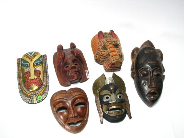 Appraisal: Group of six tribal South American masks some with paint