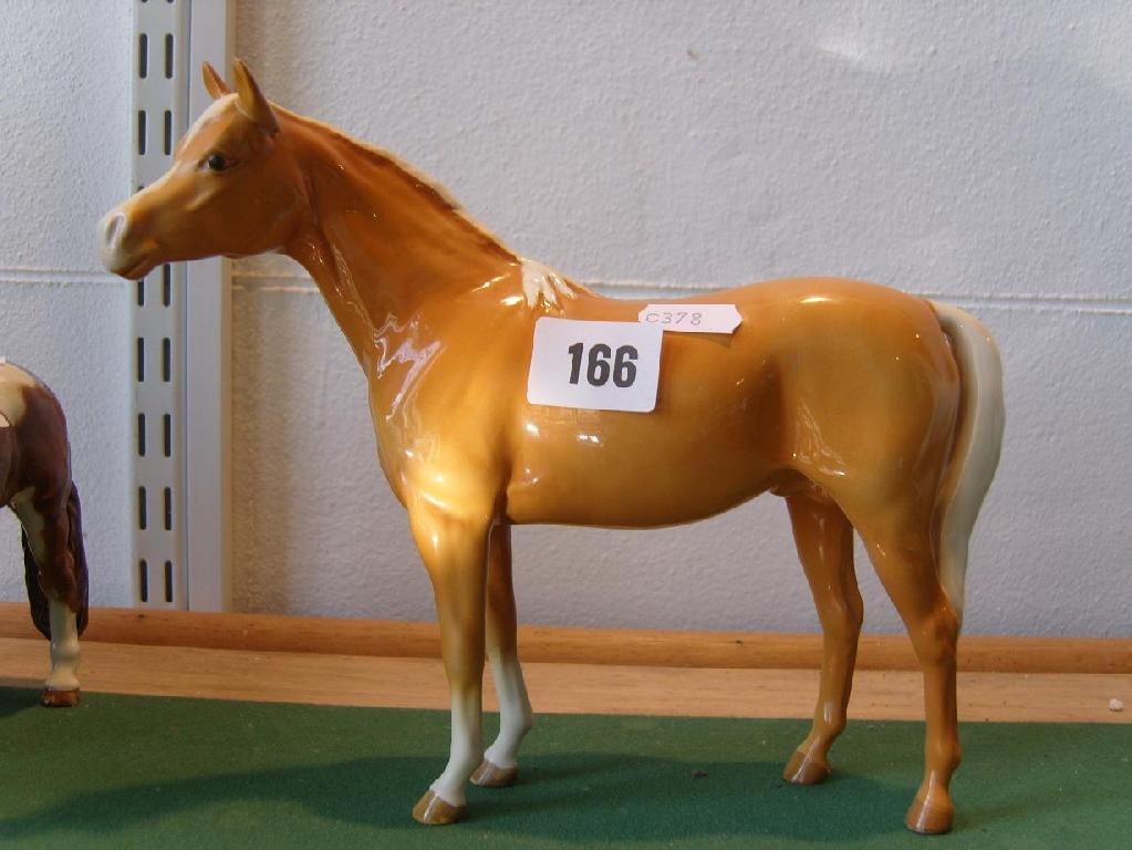 Appraisal: A Beswick model of a Palomino horse -