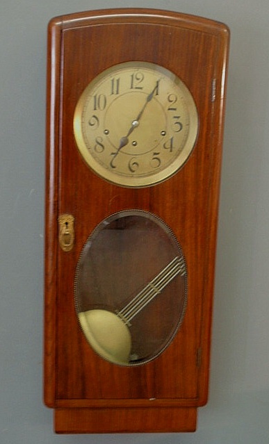 Appraisal: Rosewood cased wall clock th c with a three-train German