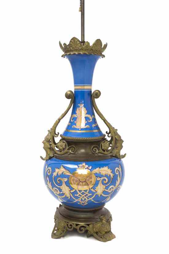 Appraisal: A French Porcelain and Gilt Metal Mounted Table Lamp of