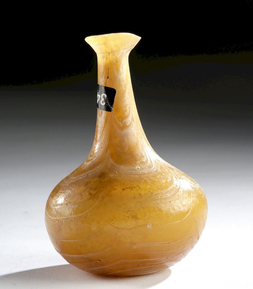 Appraisal: Roman Glass Bottle - Swirling Yellow Pattern Originally Listed At