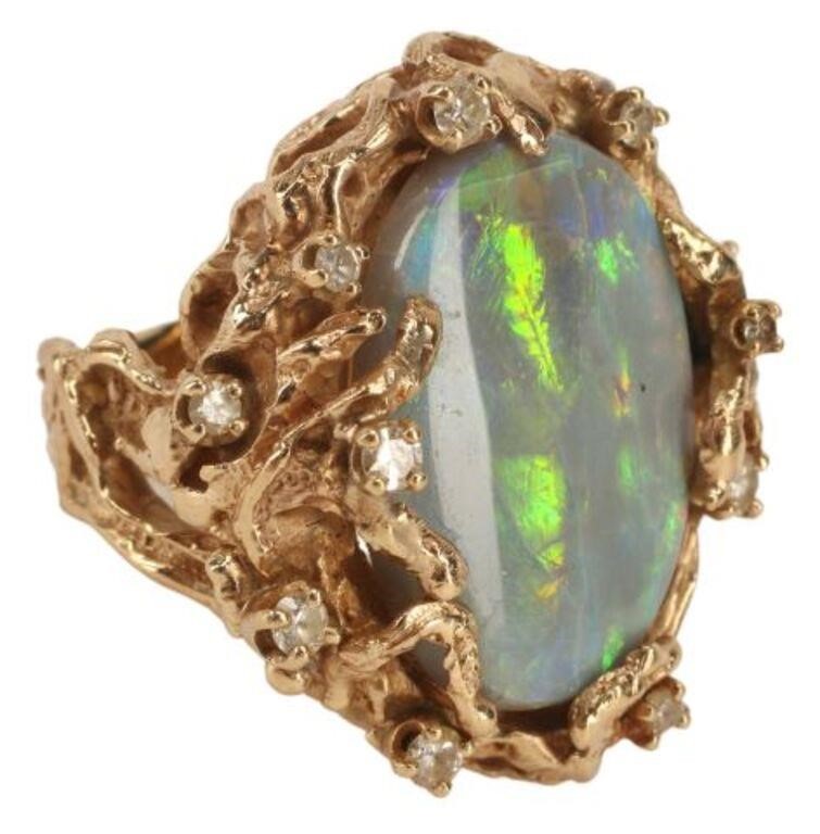 Appraisal: Estate kt yellow gold ring opal cabochon framed by twelve