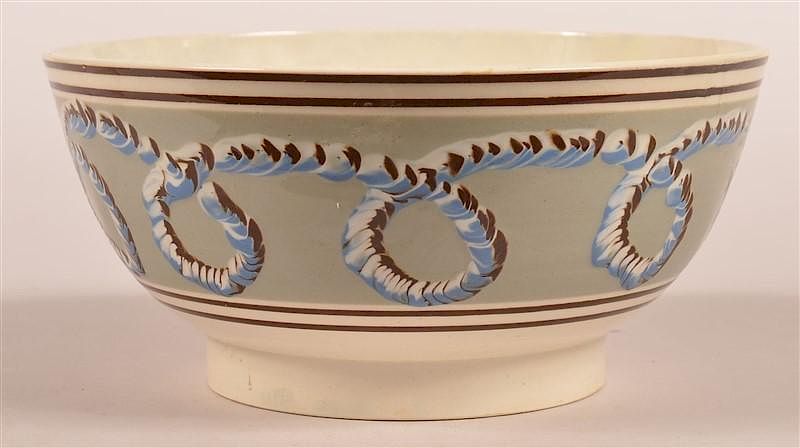 Appraisal: Looping Earthworm Pattern Mocha Mixing Bowl Looping Earthworm Pattern Mocha