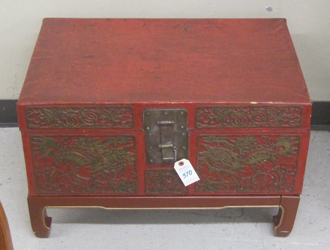 Appraisal: CHINESE RED LEATHER TRUNK having a flat rectangular lift top