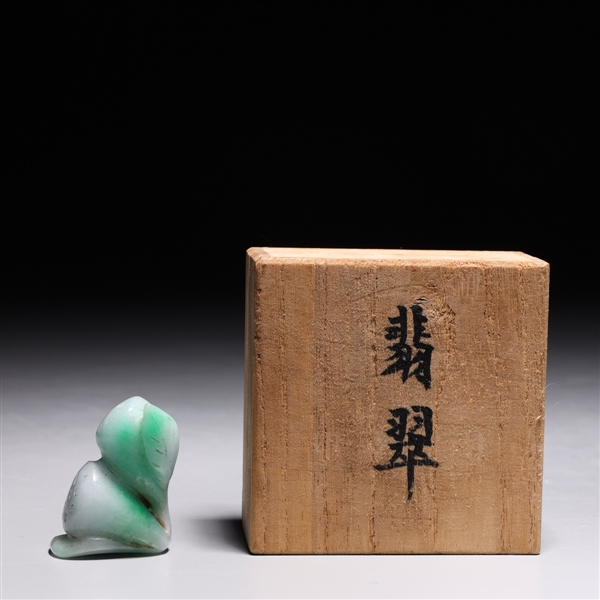 Appraisal: Chinese carved jadeite lotus form toggle with bring green coloration