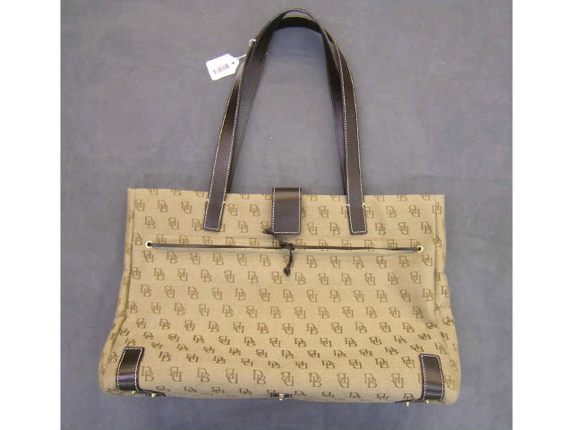 Appraisal: Dooney amp Bourke handbag tote brown monogrammed exterior snap closure