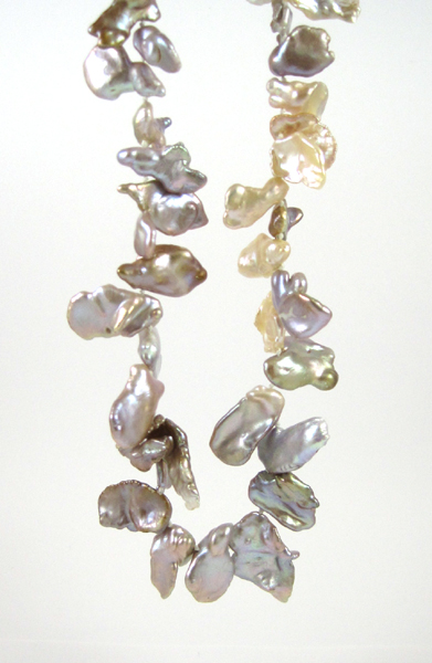 Appraisal: PRINCESS LENGTH KESHI PEARL NECKLACE measuring inches in length and